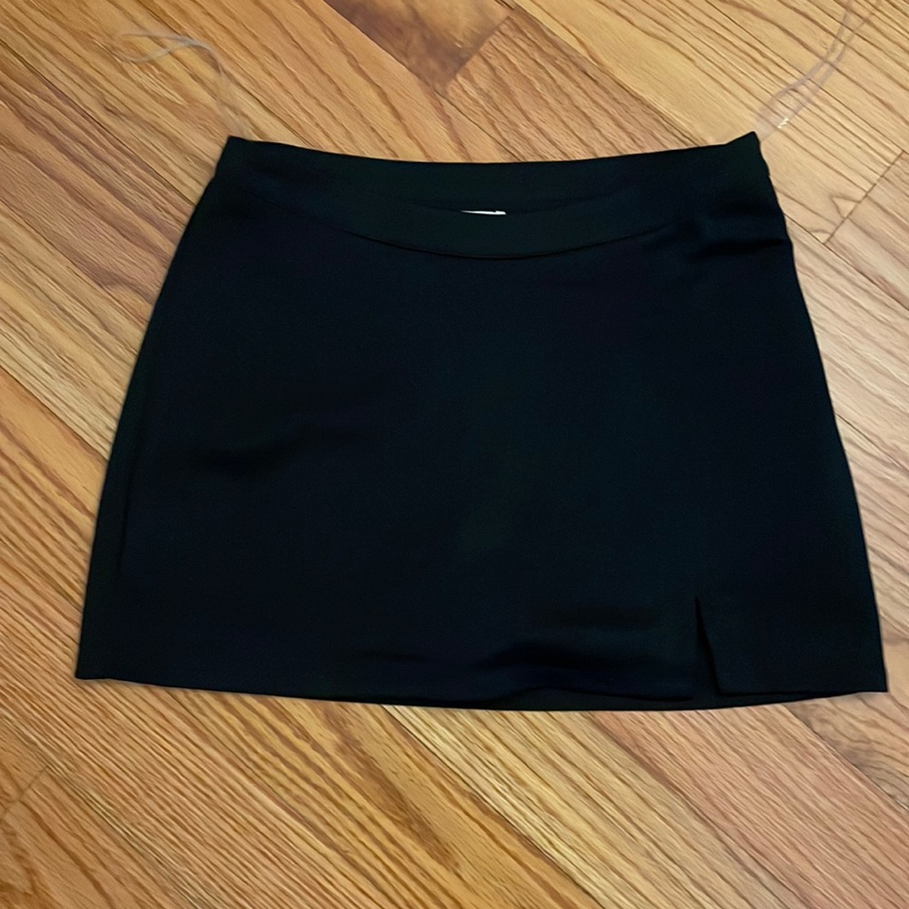 Black mini skirt with slit